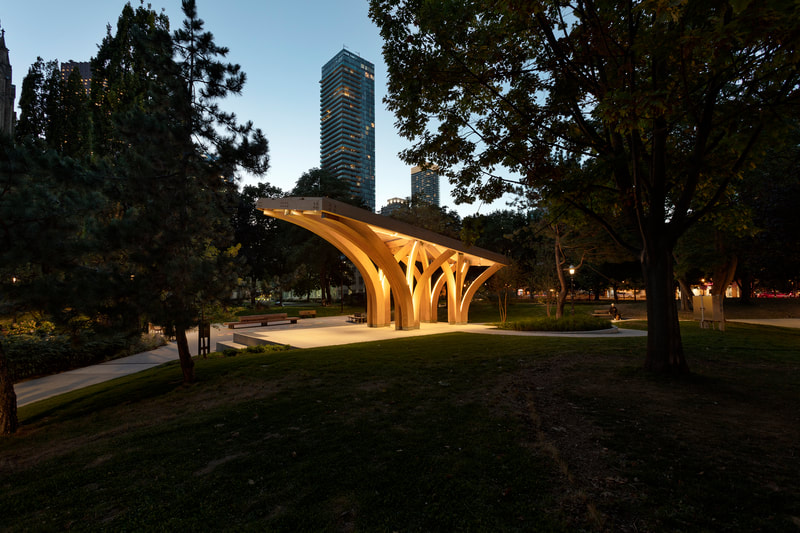 st. james park pavilion lit up at dusk by architecture firm raw design and lighting designer marcel dion in toronto, ontario