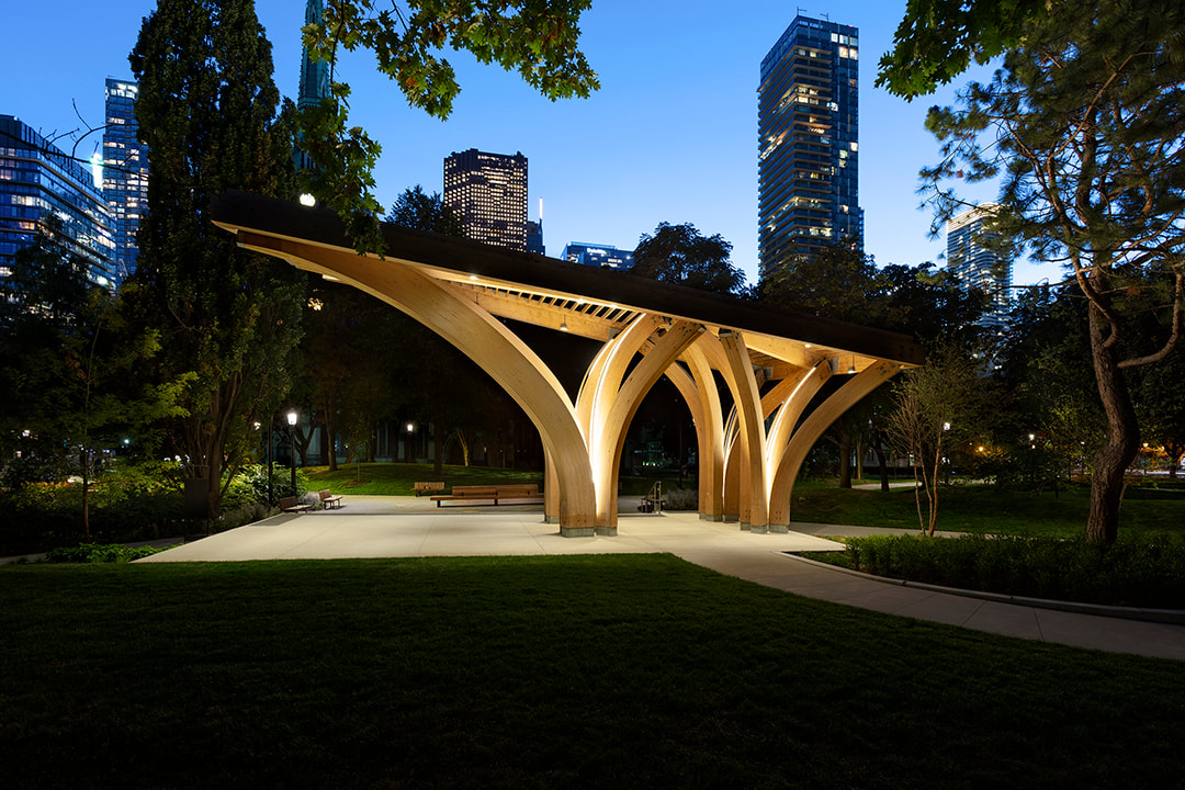 st. james park pavilion in toronto lit up at dusk by architecture firm raw design and marcel dion lighting design, krista jahnke photogrpahy